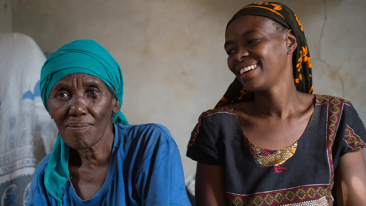 Two women engaged in a supportive and empathetic conversation in a room.